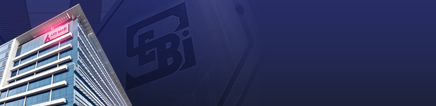 Axis Bank high-rise tower with the bank logo lit up beside a faint SEBI emblem on a dark blue background